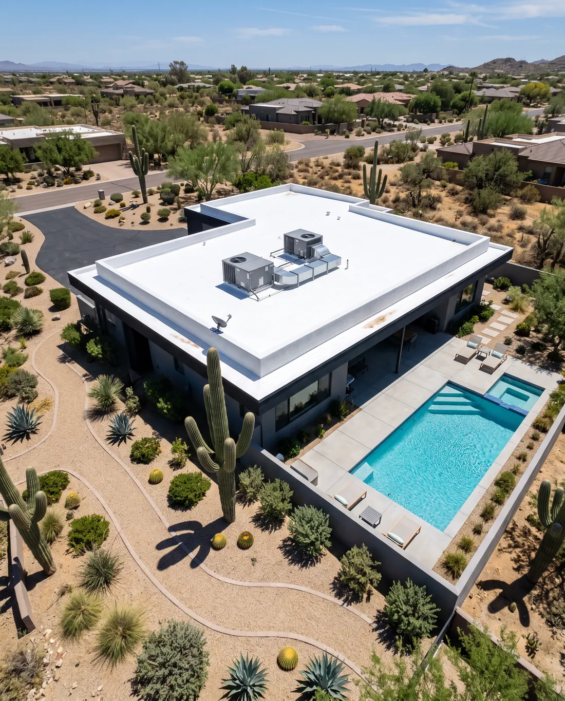 A flat desert roof with a new white reflective coating